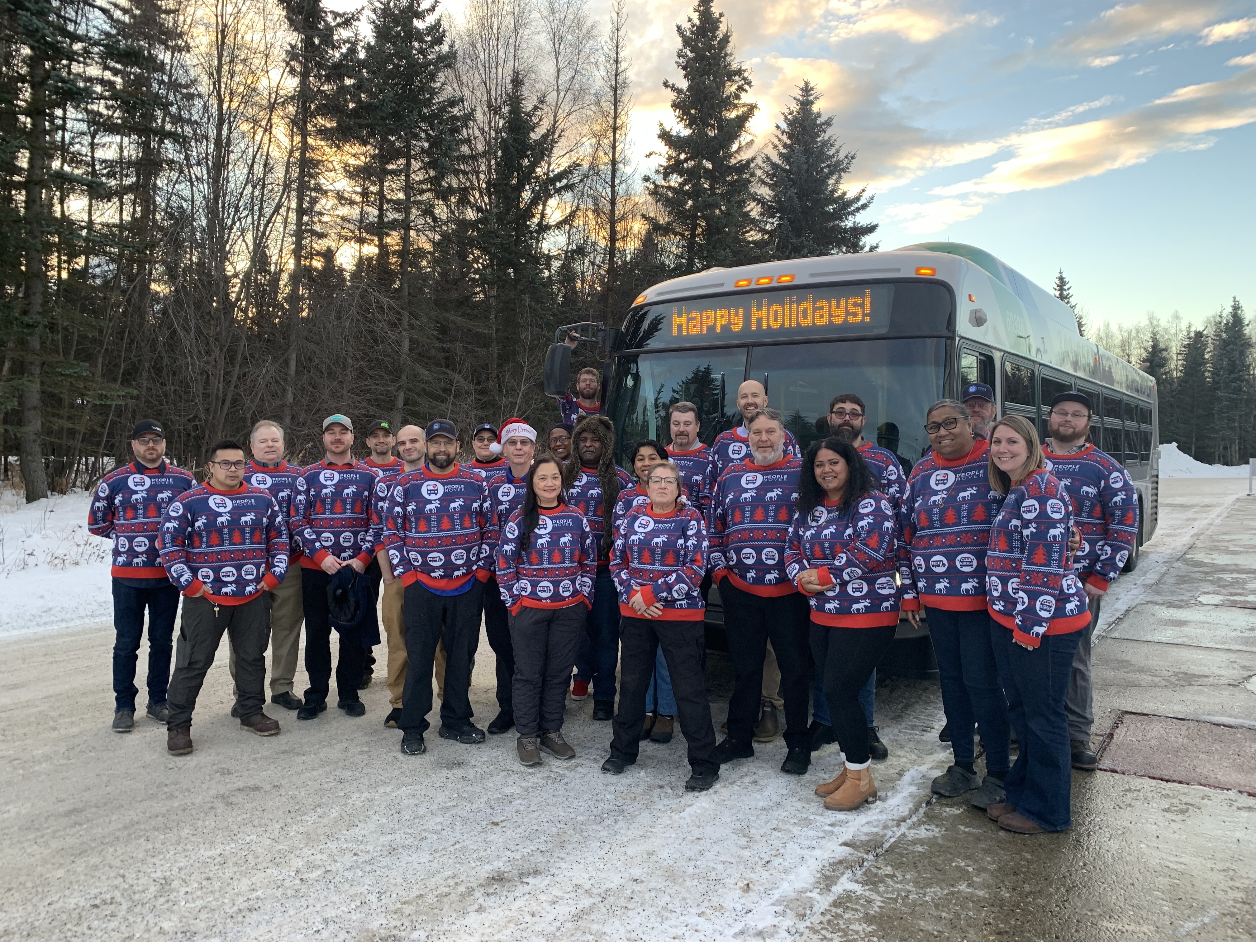 PM Group Holiday Sweaters 2024.JPG