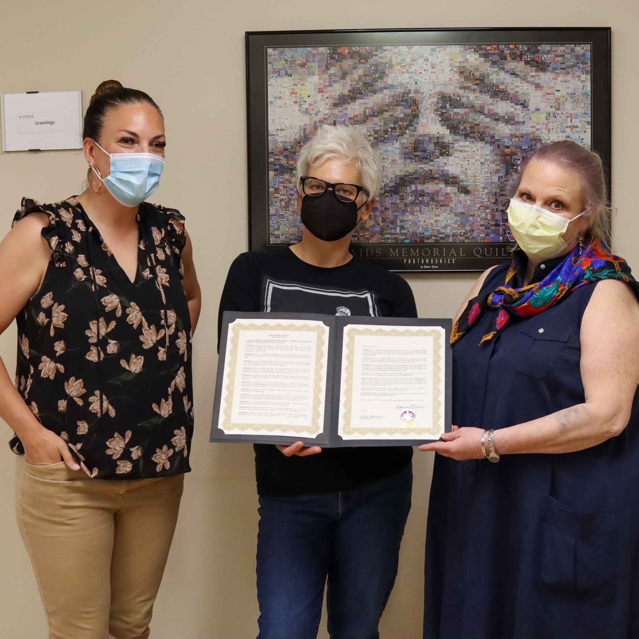 Venus Woods and Robin Lutz of Four A's and Reva Katz from the health department pose with the National HIV Testing Day Assembly 